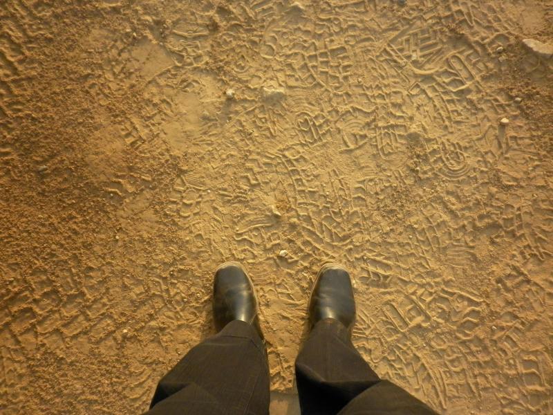 boots among tire tracks